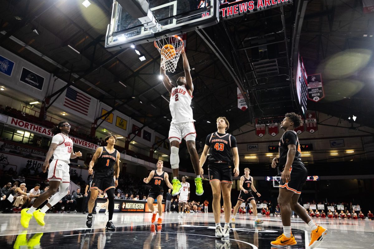 Graduate forward Alexander Nwagha dunks the ball into the hoop during a game against Princeton University Nov. 10. Read more here.