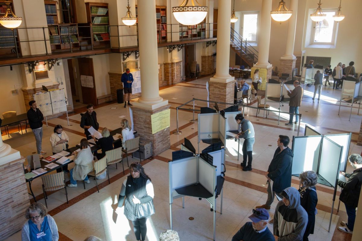 Voters filter in and out of the Copley Square branch of the Boston Public Library. Those in precinct 2 of ward 4 and precinct 8 of ward 5 could vote at the library.