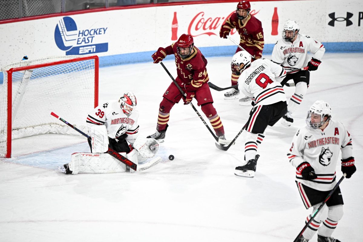 In a game against Boston College, sophomore goaltender Cameron Whitehead blocks a shot at goal Nov. 23. Read more here.