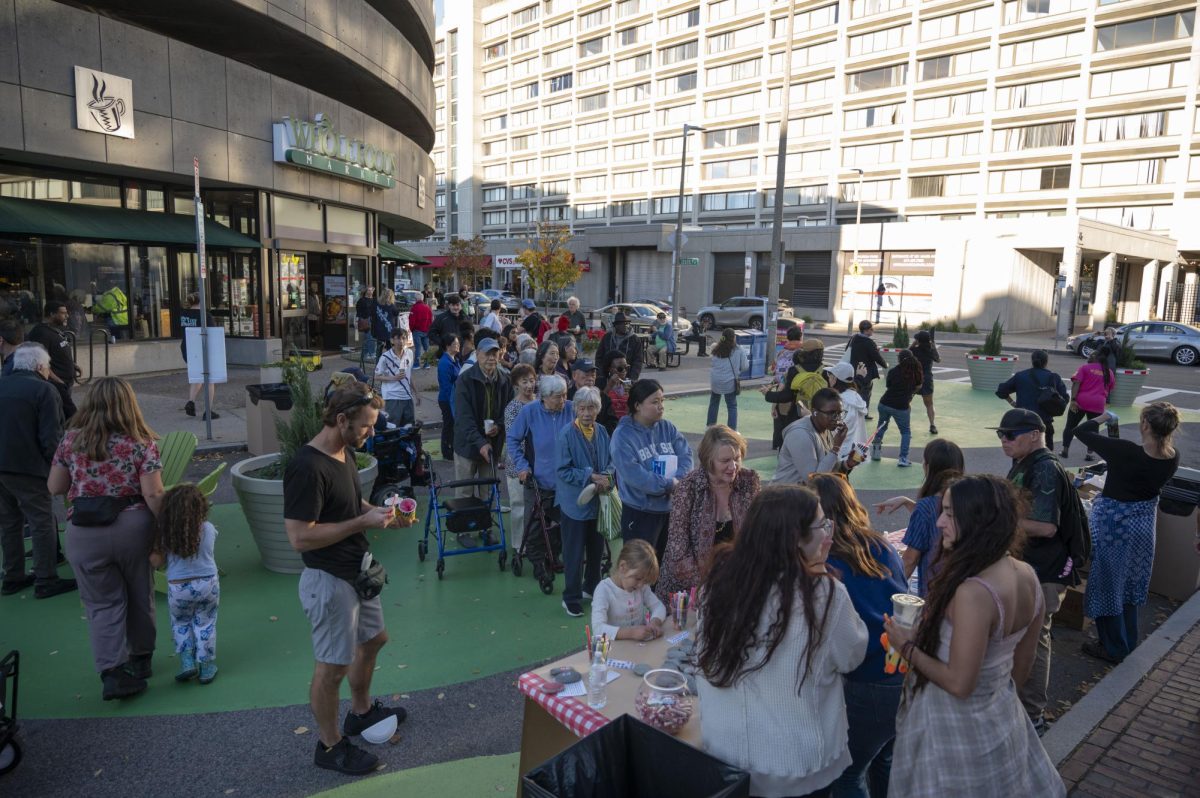 Participants of the New Edgerly Plaza Launch Party wait in line for free food. The plaza opened Oct. 30, with the party being held Nov. 1.