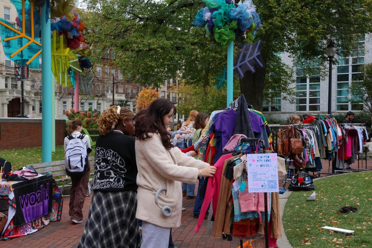 Students skim the clothing racks on Krentzman Quad. Many students looked at clothing and accessories between classes.