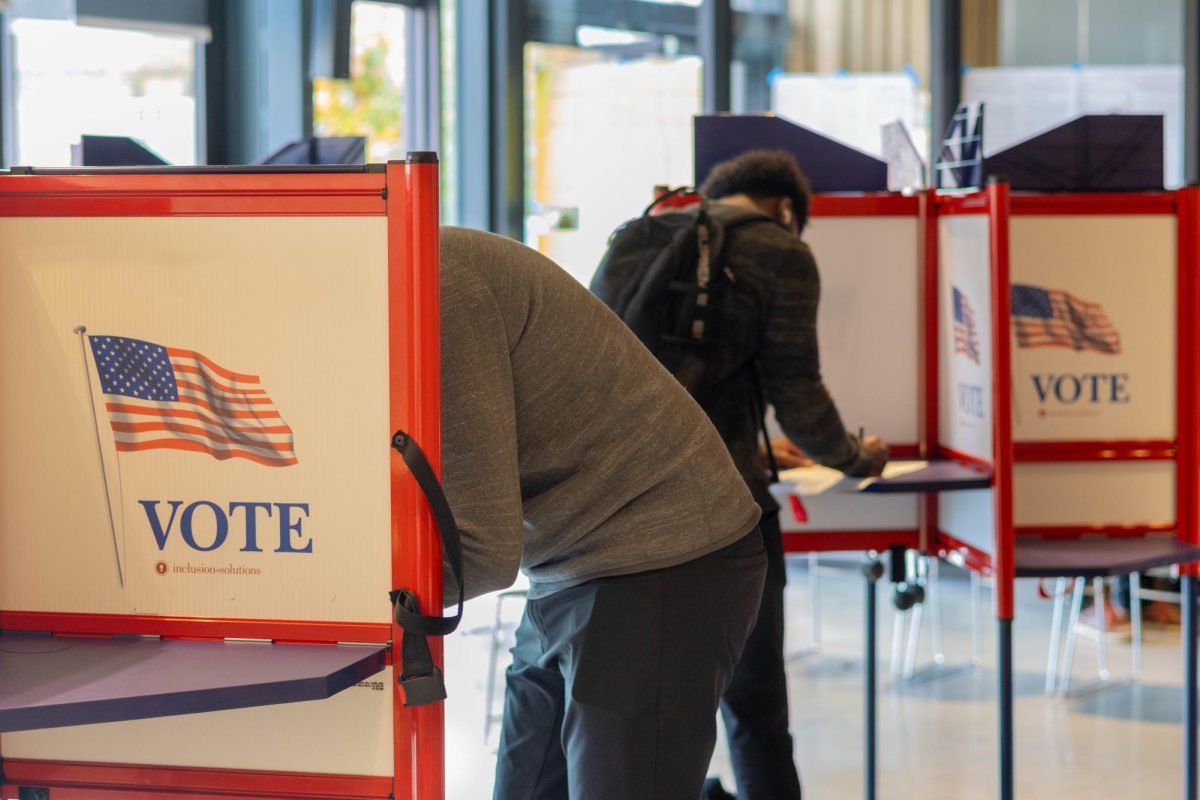 Voters complete their ballots at City Plaza Pavilion Nov. 5. The Massachusetts polls remained open from 7 a.m. to 9 p.m.