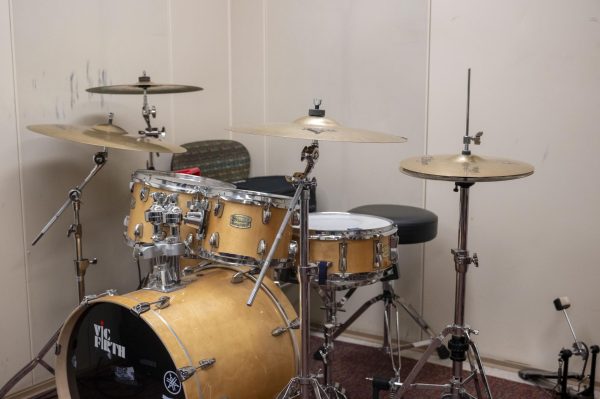 A drum set in the Ryder 364 practice room. Students expressed frustrations with the limited number of music and performing arts practice spaces available on campus.