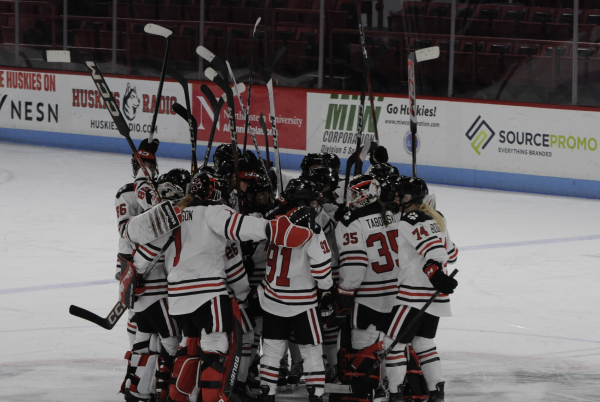 The Huskies celebrate after notching a 2-0 shutout over the University of Maine Nov. 16. Northeastern secured the weekend sweep, tallying a 2-1 win Nov. 15.