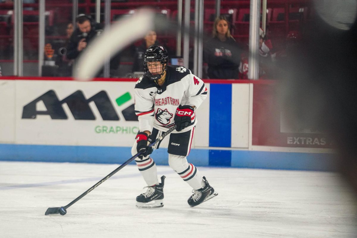 Tory Mariano dribbles the puck against Boston University Oct. 11. The Huskies recorded back-to-back shutouts against UConn Nov. 8 and 9.