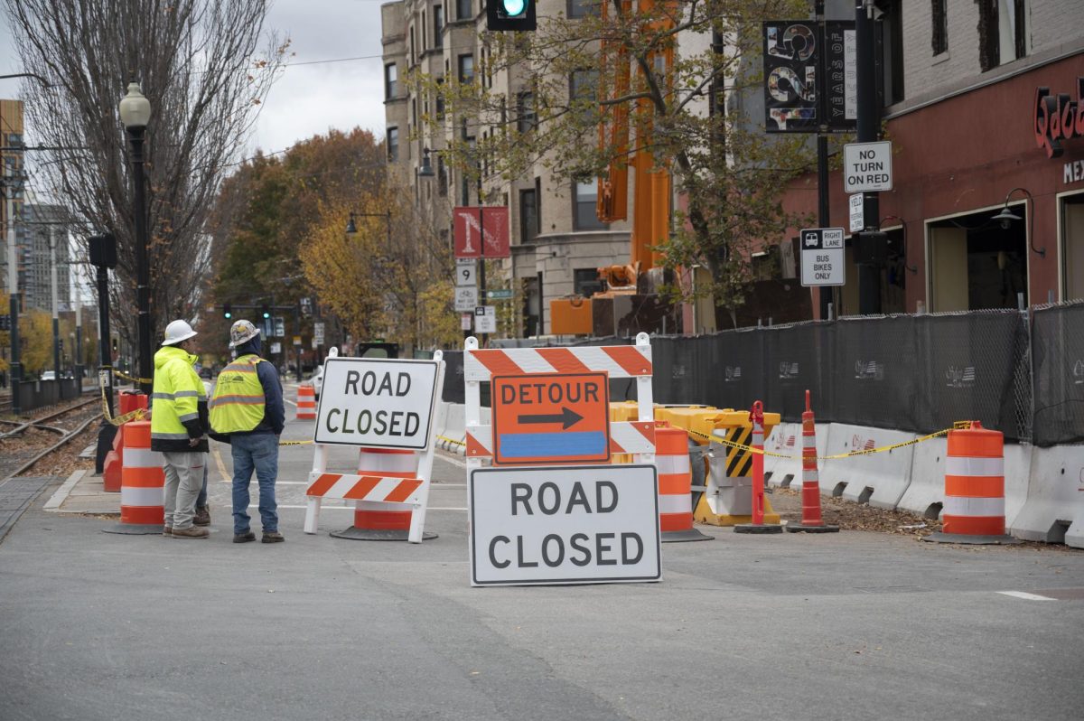 Signs that read "Road Closed" redirect drivers on Huntington Avenue. Northeastern Planning, Real Estate, and Facilities announced in an email to students on the Boston campus that the portion of the road will be closed Nov. 2 and Nov. 3.