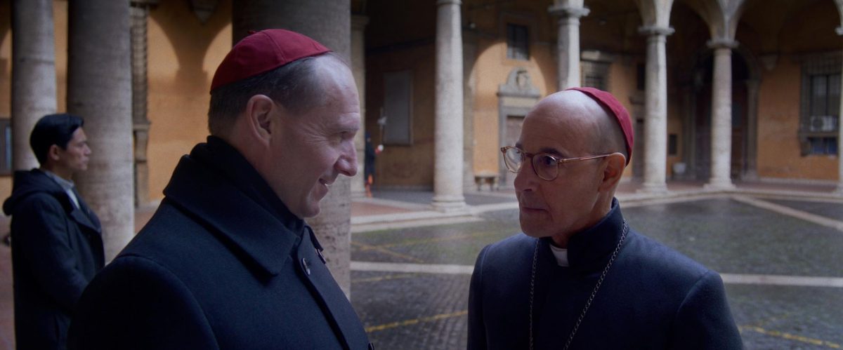 Ralph Fiennes (left) and Stanley Tucci star in “Conclave.” The film was made as a fictionalized rendition of the bureaucratic procedures that take place during a new pope’s selection. Photo courtesy Focus Features.