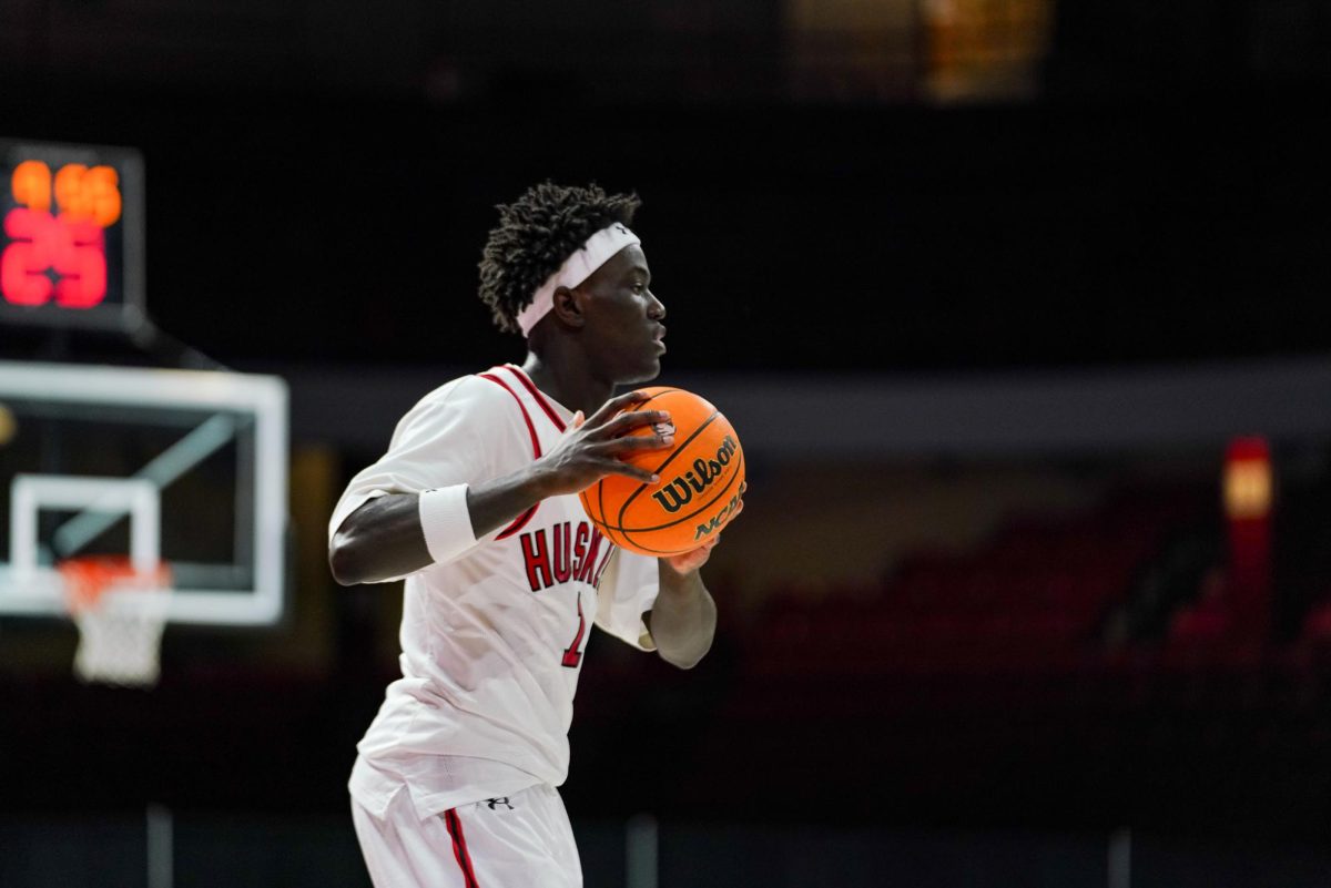 Masai Troutman holds the ball as he figures out his next move. Troutman earned 17 points against Northwestern.