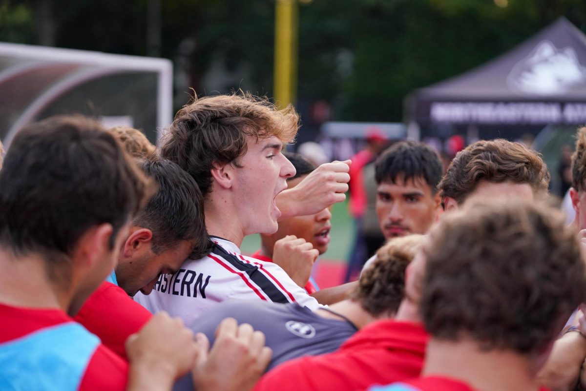 The Northeastern men's soccer team gathers before they play Harvard Sept. 17. The team finished the 2024 season 4-5-7 overall with a 2-4-2 record in the CAA. 