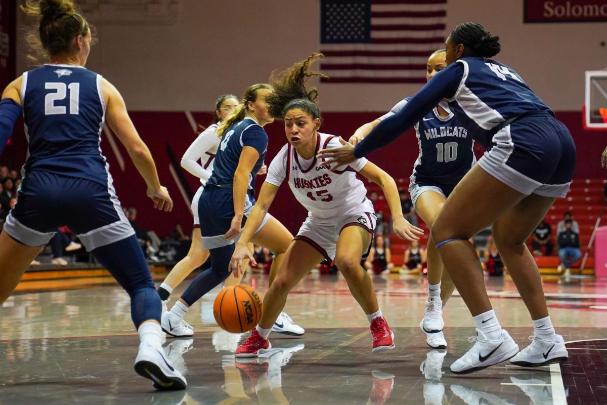 Yirsy Quéliz dribbles the ball against University of New Hampshire Nov. 14. The Husky tallied 37 points in the first four games of the season.