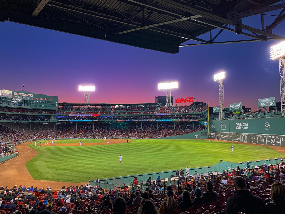 Baseball is played at Fenway Park at night. Northeastern baseball will face off against Harvard, Boston College and University of Massachusetts Amherst April 29 in the first Baseball Beanpot at Fenway Park since 2019. File photo by Kelly Thomas.