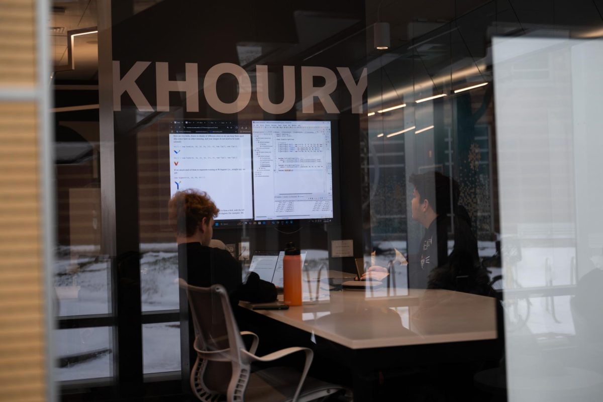 Students work in the Khoury computer lab in West Village H. The core curriculum of the Khoury College of Computer Sciences was changed by a faculty vote Jan. 15. 