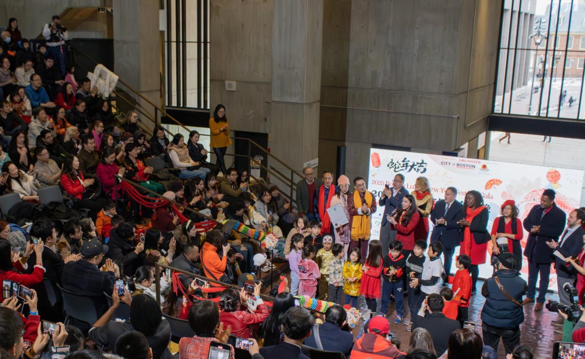 DiZoglio stands before the audience. Boston City Council members cheered her on as she joined children from the crowd in singing Chinese songs to celebrate the Lunar New Year.