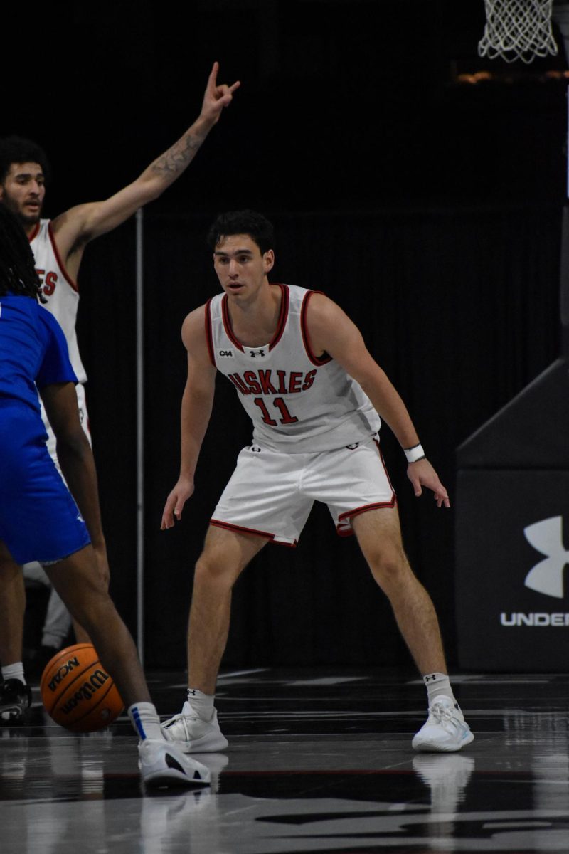 JB Frankel keeps his eyes on his opponent, waiting for him to make his move Jan. 4. Frankel collected 13 points and one steal against UNCW Jan. 16.