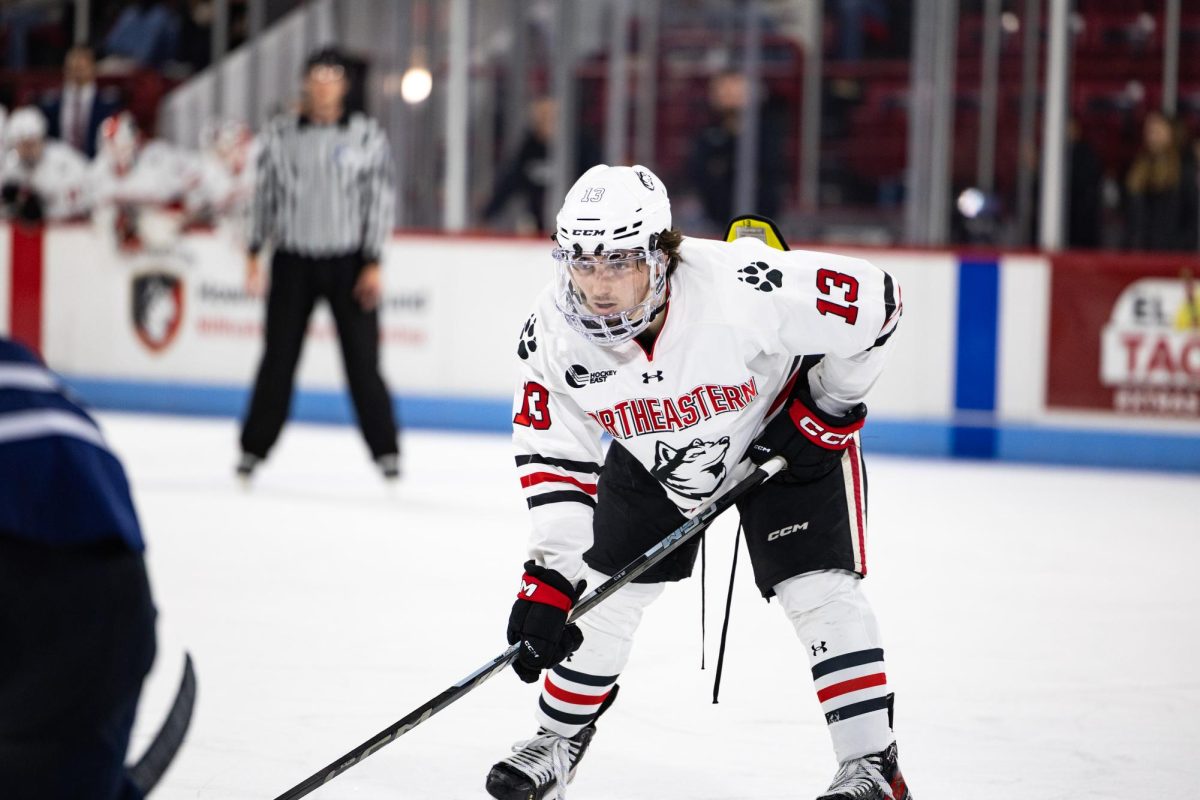 Sophomore forward Dylan Hryckowian stares down the ice Nov. 16. Hryckowian tallied a hat trick Jan. 4, the first of his career and the first of Northeastern's 2024-25 season.