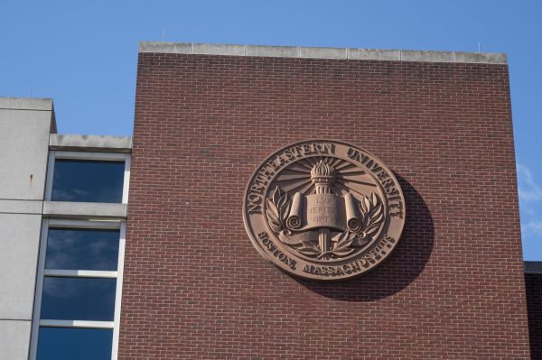 A Northeastern emblem on the Boston campus. A faculty senate meeting Jan. 15 included the presentation of a policy that would increase the number of successive terms senators can serve.