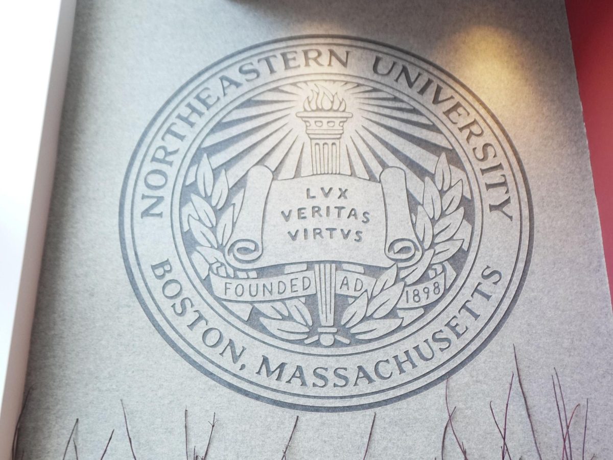 A Northeastern seal at 716 Columbus Ave. Faculty were asked to cease all DEIA-related research.