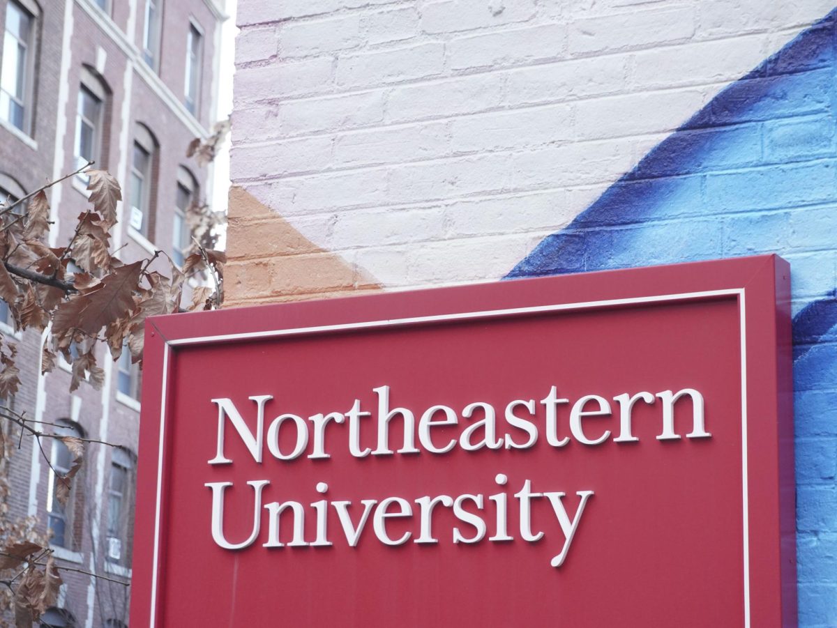 A Northeastern University sign on the Boston campus. Faculty members expressed concerns over the future of DEI offices at the university at a faculty senate meeting Jan. 29.