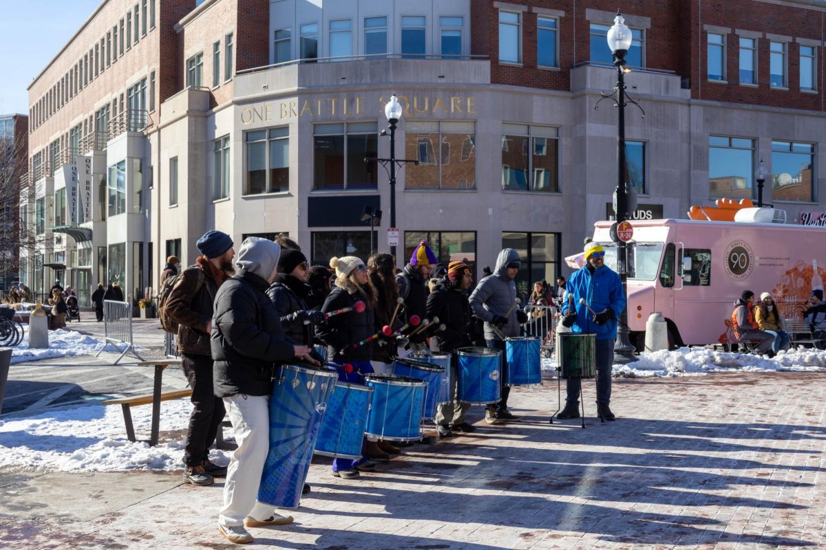 Grooversity
 drums upbeat tunes for people as they walk through the Chocolate Tasting Event. The band played from 1 p.m. to 2 p.m., with people dancing to their beats as they walked by.