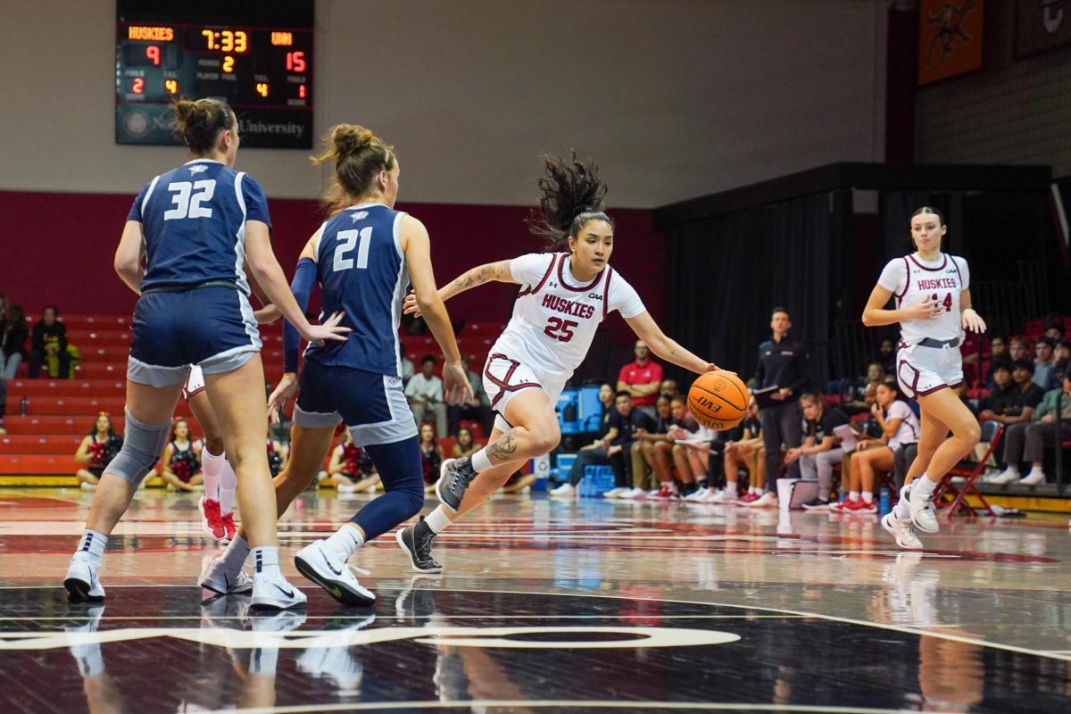 Natalie Larrañaga dribbles past the defenders Nov. 14, 2024. Larrañaga notched 10 points against UNCW Jan. 12.