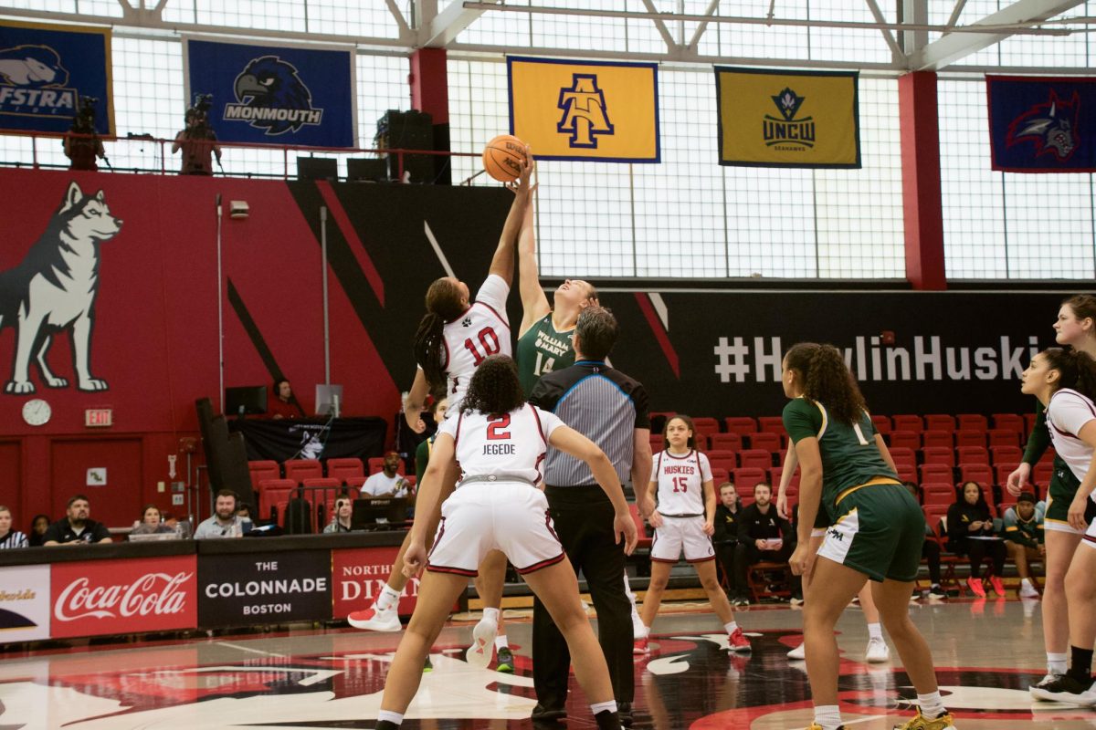 Freshman center Alyssa Staten wins a tipoff Jan. 19. The Huskies appeared undisciplined, leading to eight turn overs compared to Stony Brook’s two.