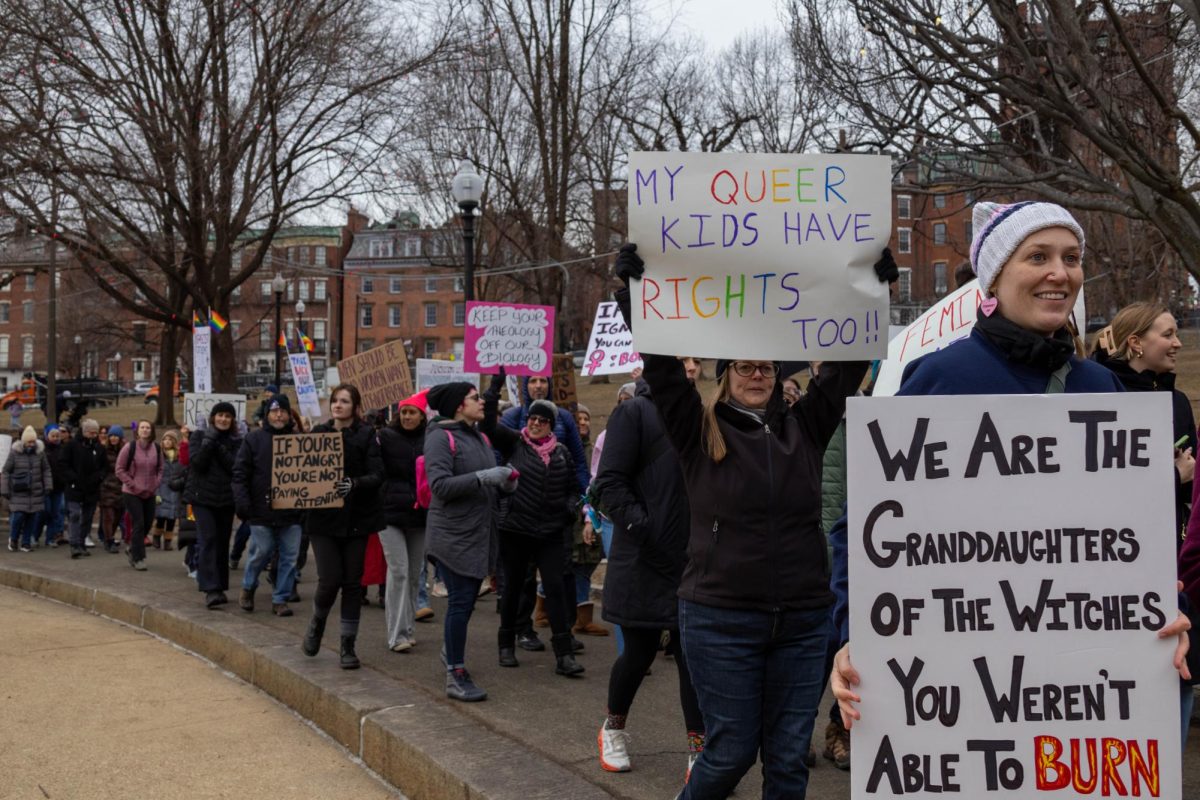 Protesters march with signs and smiles through Boston Common. People from all over the country and of all ages walked to advocate for gender equality and freedoms.