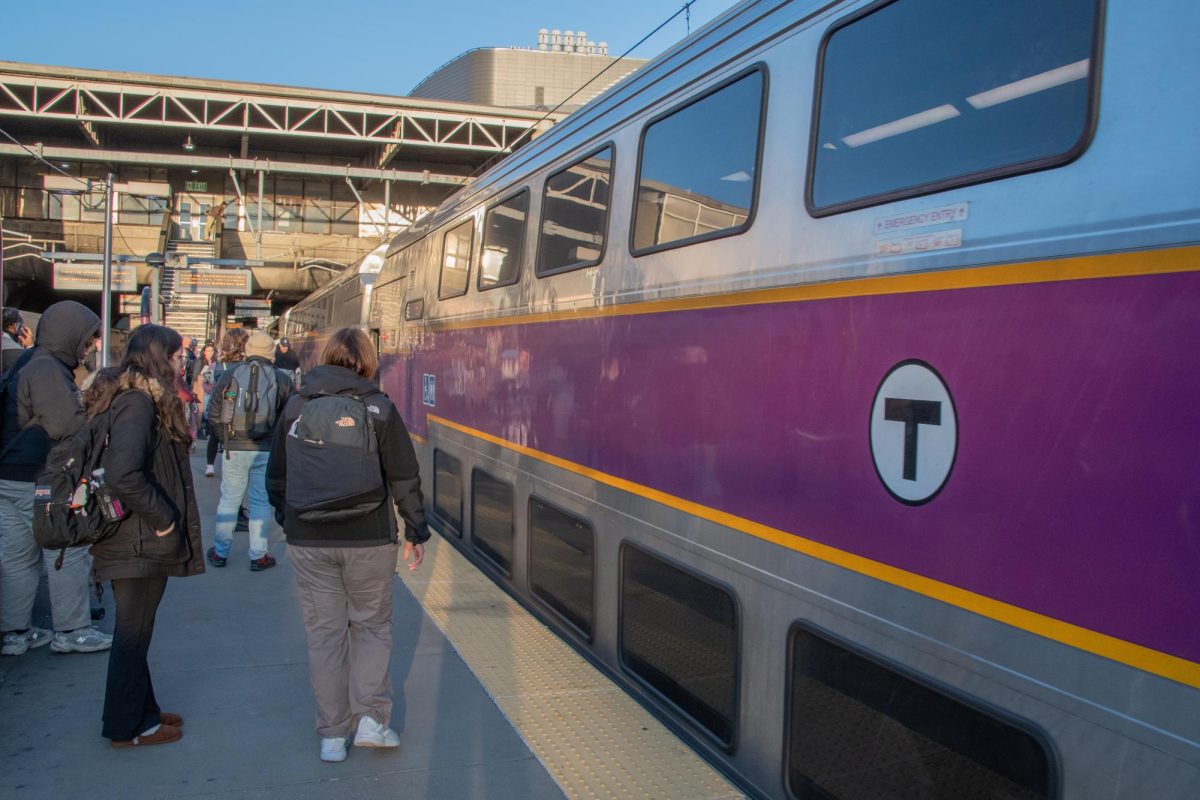 Passengers board a Commuter Rail train. The Huntington News selected five New England spots for spring break.