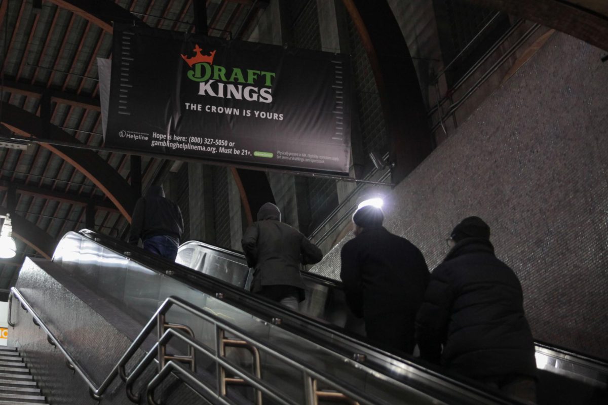 A DraftKings ad hangs above visitors in the Back Bay T stop. Richard Daynard helped the PHAI file a class action lawsuit against DraftKings for unfair and deceptive advertising in 2023.