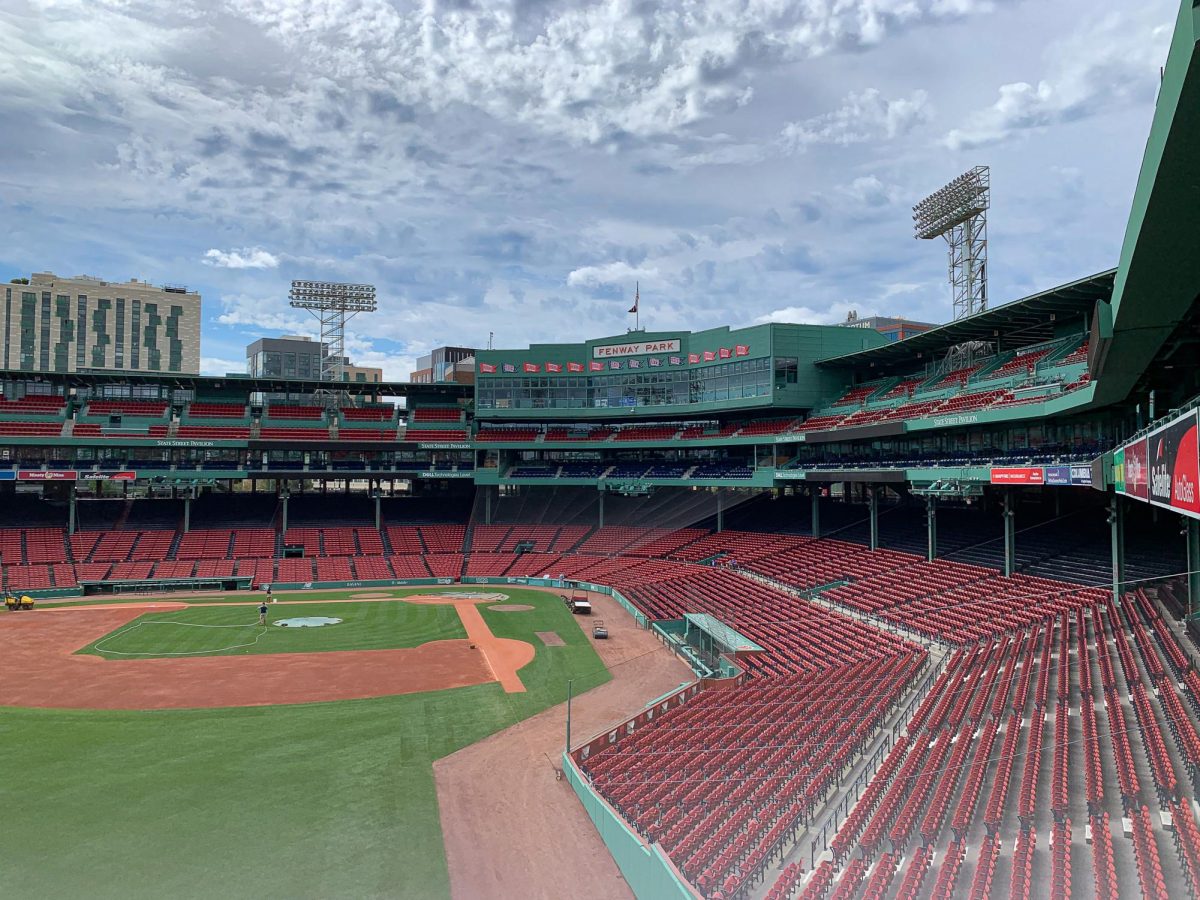 Staff water and prepare Fenway Park for an upcoming baseball game. The stadium contained over 37,000 seats, leaving plenty for students utilizing the Student9 discount. File photo by Kelly Thomas.