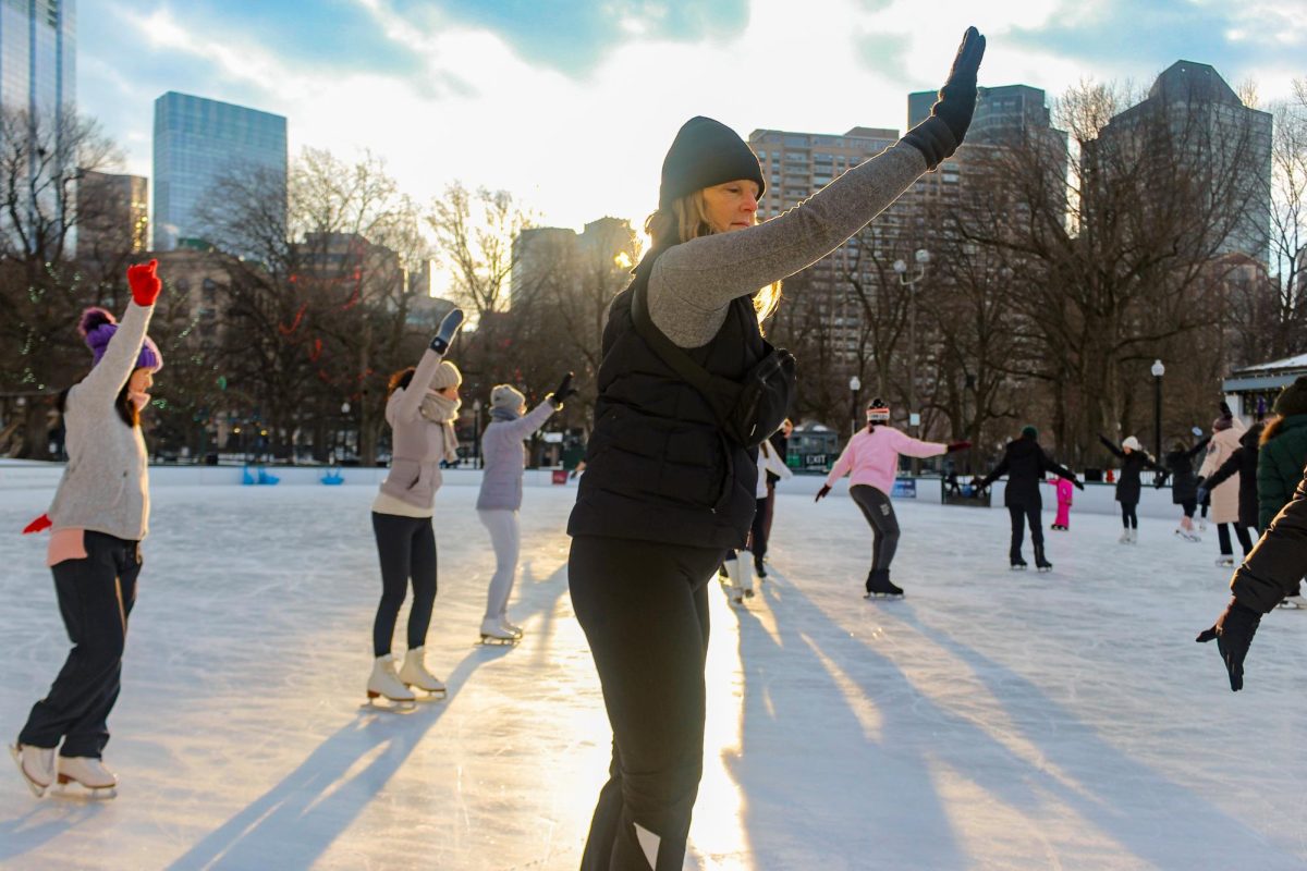 An attendee skates slowly across the ice with fellow participants, some of whom were first-timers and signed up for the class by themselves. Many attendees appreciated meeting and connecting with a new community at the class.