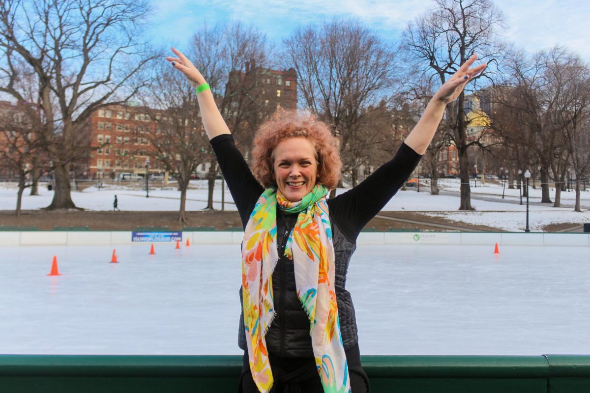 Schran poses for a portrait in front of the Frog Pond rink after teaching her class. After years of competitive skating, Schran said that IceFlow brought her a new sense of peace and fulfillment on the ice.