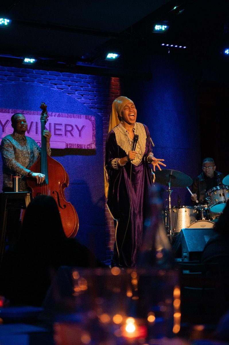 Horn hits a high note while her band members look on. She performed songs from her latest album, “Messages,” an album encouraging those facing tough choices and sacrifice that difficulties along the way are worth it.