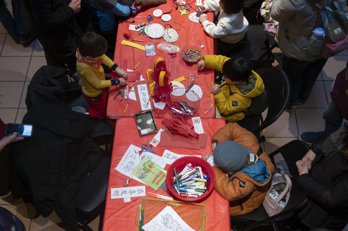 Children color, make bead jewelry and create paper crafts. Children of all ages and their parents enjoyed the festivities.