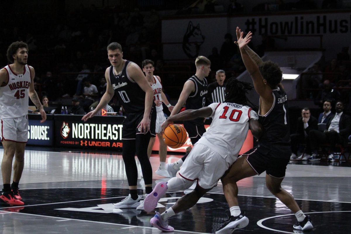 Harold Woods drives to the basket. Woods collected 19 points and four steals against College of Charleston Feb. 20.