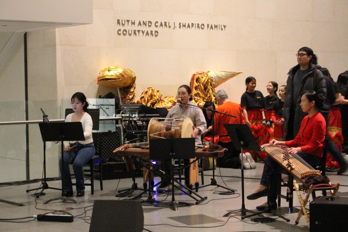 Gipeun members perform traditional Korean instruments in the Shapiro Family Courtyard. The MFA's Lunar New Year event showcased Chinese, Korean and Vietnamese culture.