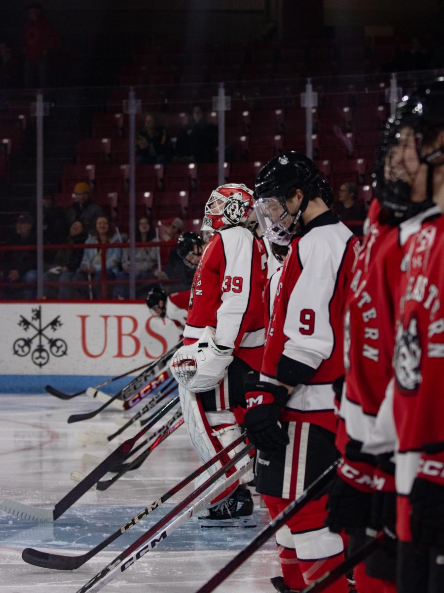 The men’s hockey team waits on the line for their starters to be called Jan. 25. The team lost their last two consecutive games against University of Maine Jan. 31 and Merrimack College Jan. 25.