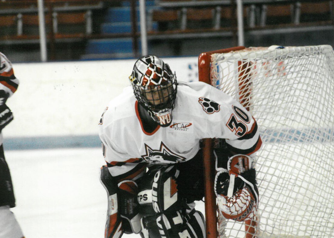 Erika Silva Adams in the net competing for Northeastern University. Adams was on the team from 1997 to 2001. Photo courtesy Erika Silva Adams.