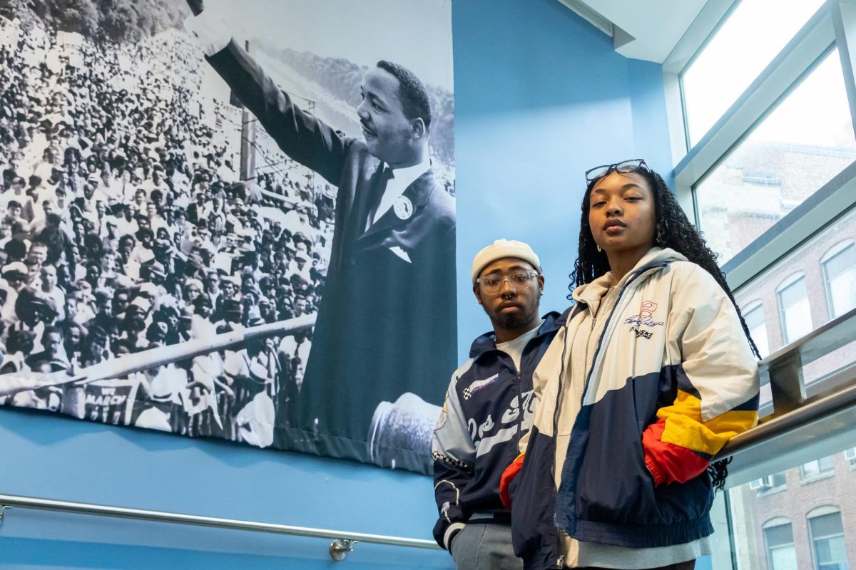 Sean Odom (left) and Phylicia Dias pose for a picture after talking about their opinions on Northeastern’s lack of Black student protection in wake of the Trump administration Feb. 16. Read more here.