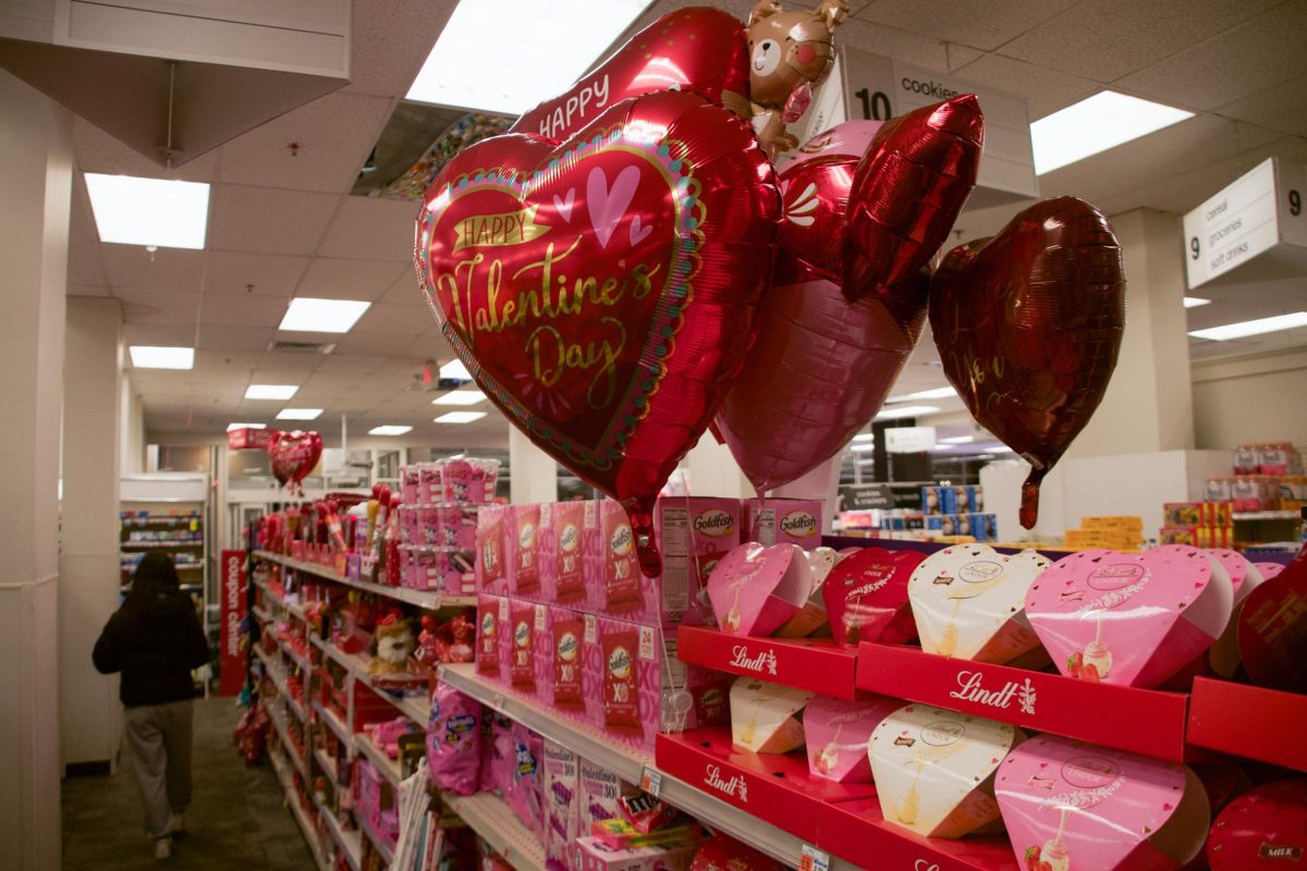 Valentine's Day balloons and chocolates on display in the CVS Pharmacy on Massachusetts Avenue. According to a Forbes survey, 79% of Gen Z experienced burnout from dating apps.