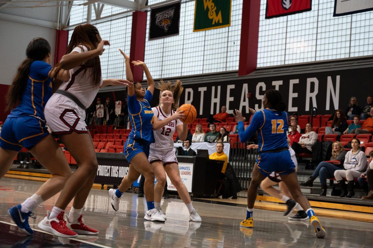 Camille Clement fights through her shot Feb. 16. Clement had six points and one assist against Towson Feb. 21.