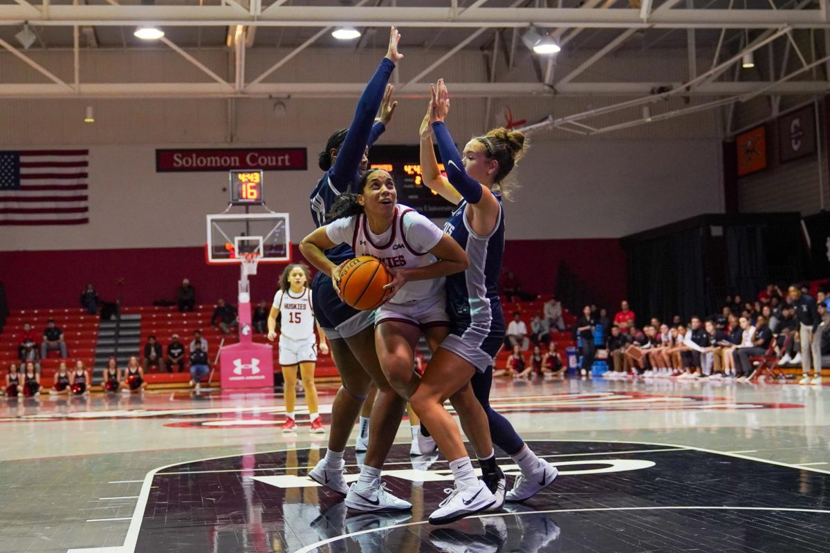 A Husky tries to find the hoop Nov. 14. The Huskies fell short in every area of the Feb. 7 game.