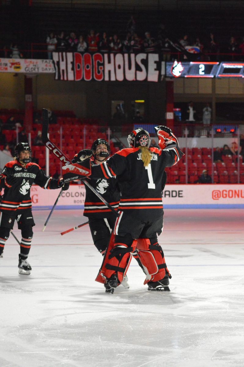 Lisa Jönsson celebrates after a Husky goal. The Huskies split a valuable weekend with their cross-town rival.