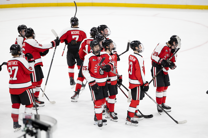 Northeastern gets ready to shake hands with Boston College after the game. The Huskies lost in the semifinals to BC 8-2 Feb. 4.