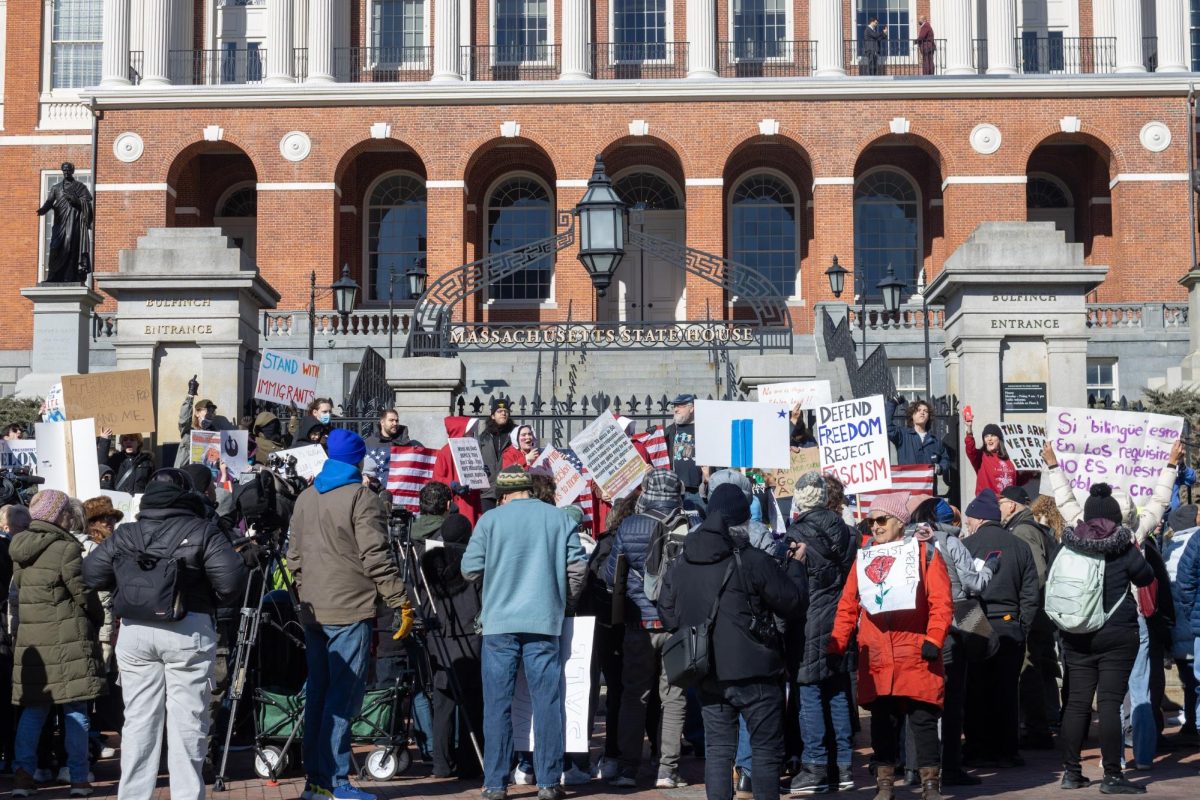 Demonstrators gather at the steps of the Massachusetts State House to voice their disapproval of Trump and Musk. The protest was one of 50 similar protests held across all 50 states on the same day to oppose the administration.