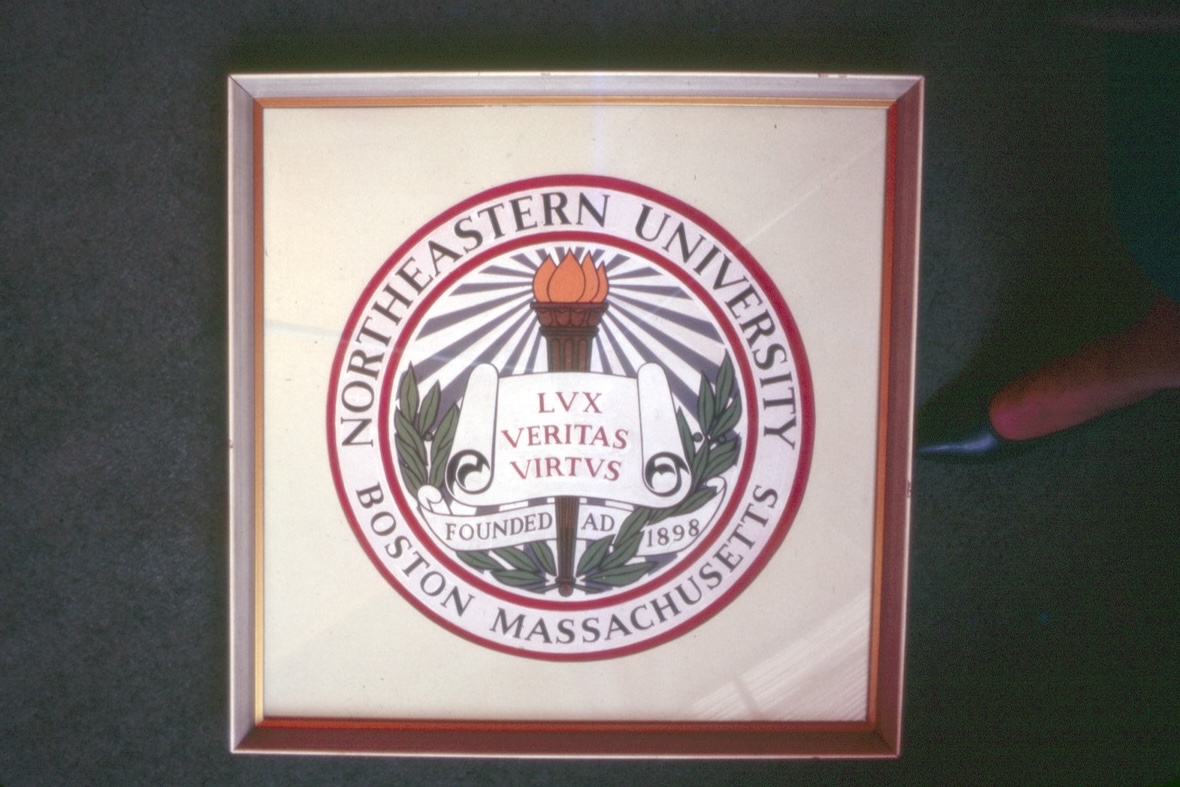 A Northeastern University seal in 1965. During the late 1950s Northeastern began solidifying the role of its PR department. Photo courtesy Northeastern University Archives and Special Collections.