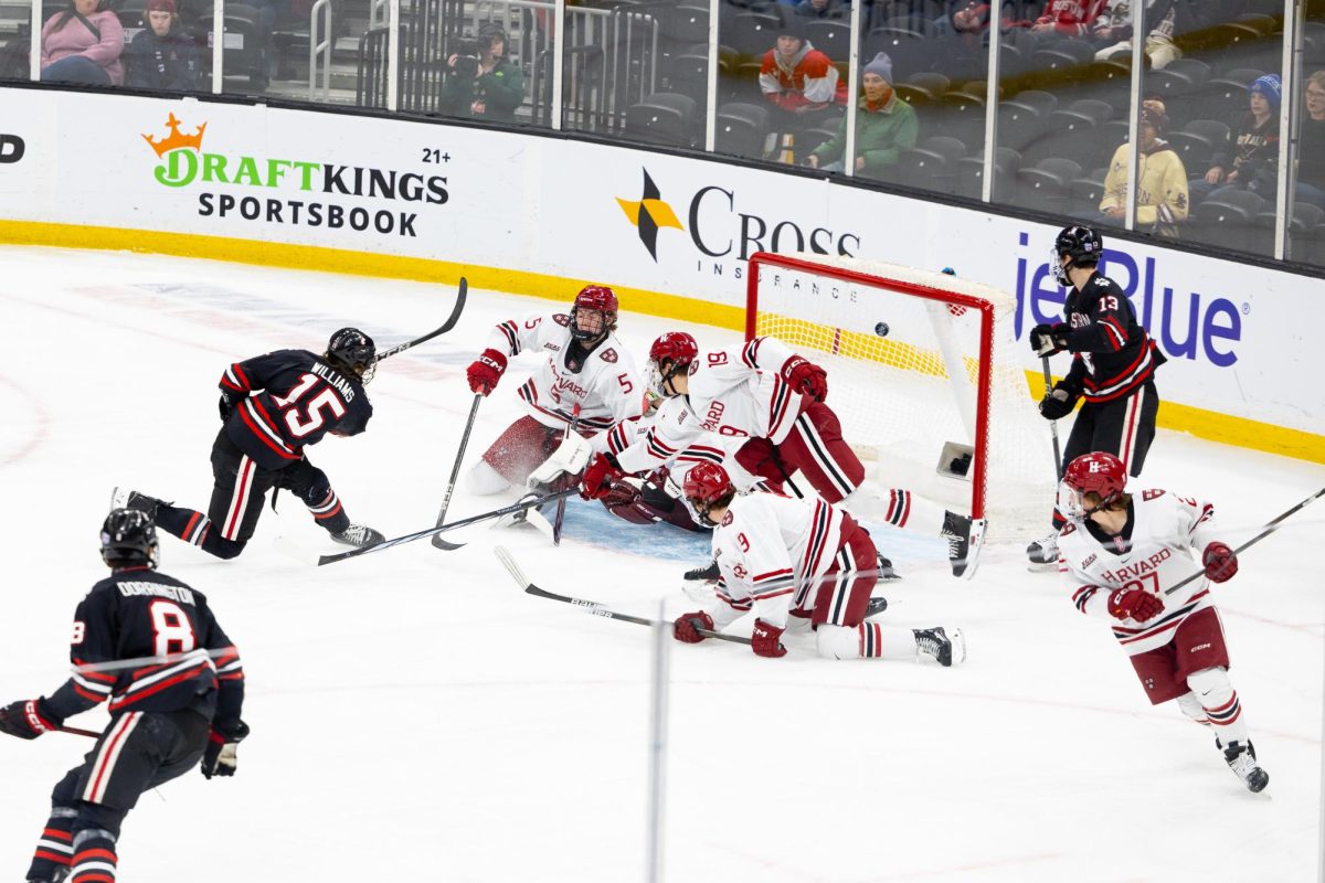 Jack Williams scores a goal Feb. 10. Northeastern men’s hockey failed to claim third place in the Beanpot tournament, losing to Harvard 4-3.