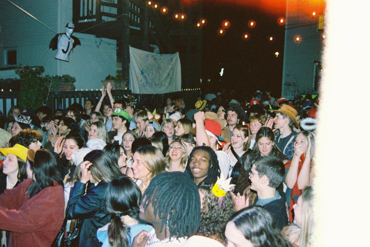 A crowd dances and smiles during an ongoing music set at *junkyard venue Oct. 26, 2024. *junkyard included an array of music, such as a dedicated "Jazz Yard" for enthusiasts. Photo courtesy Quinlan Harp.