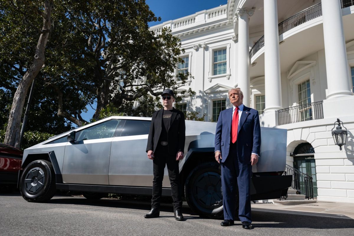 Donald Trump and Elon Musk stand in front of a Tesla Cybertruck at the White House Mar. 11. While part of DOGE, Musk fired thousands of federal employees and published wrong data under Trump's Administration. Photo courtesy The White House, flickr . 