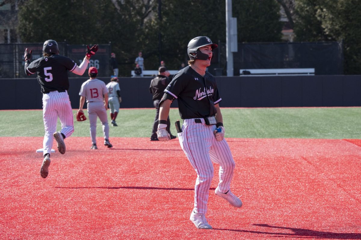 Ryan Gerety jumps in celebration March 15. Gerety scored a run against Merrimack March 18.