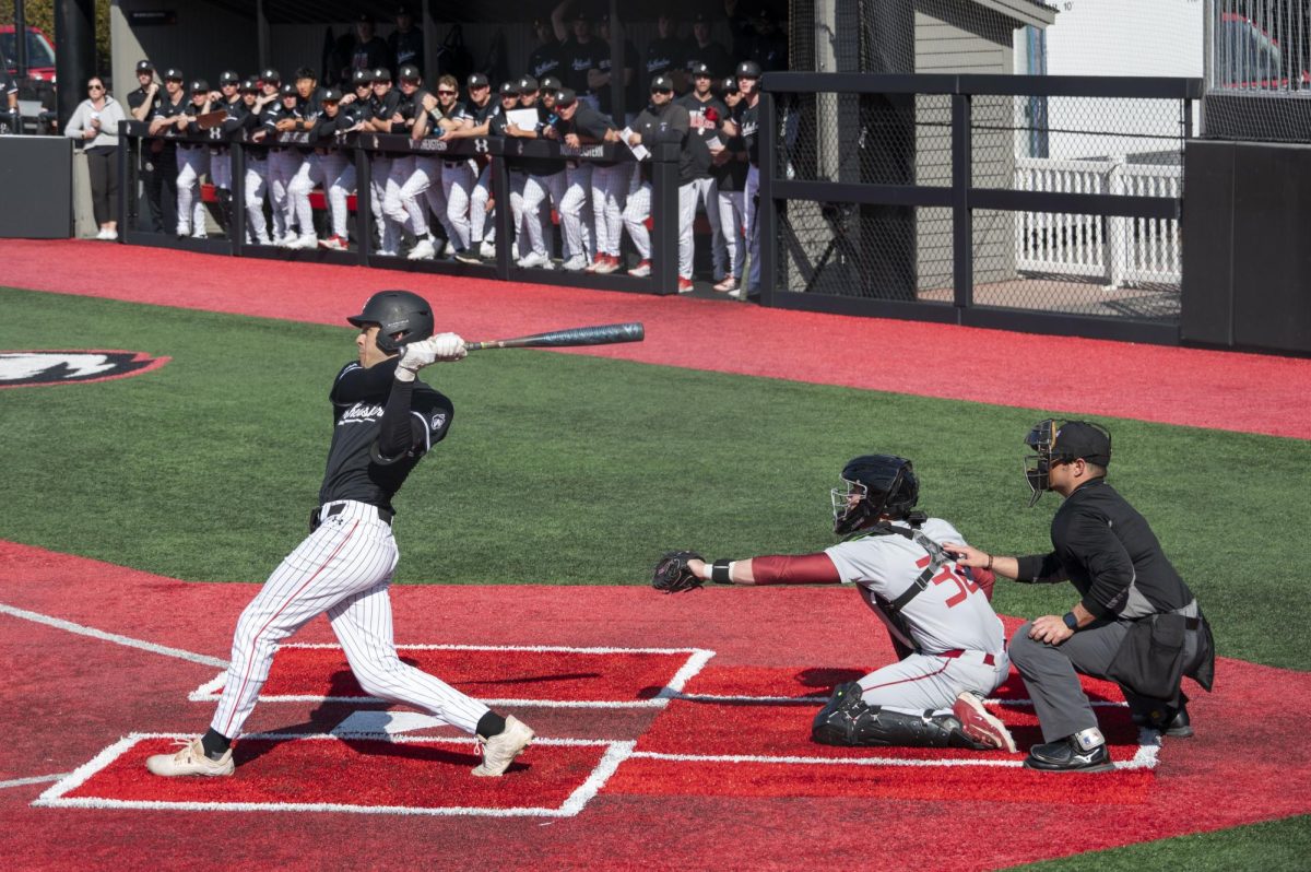 A Northeastern player hits the ball March 15. Northeastern took its first shutout since 2022 March 19 in a 6-0 loss to Boston College. 